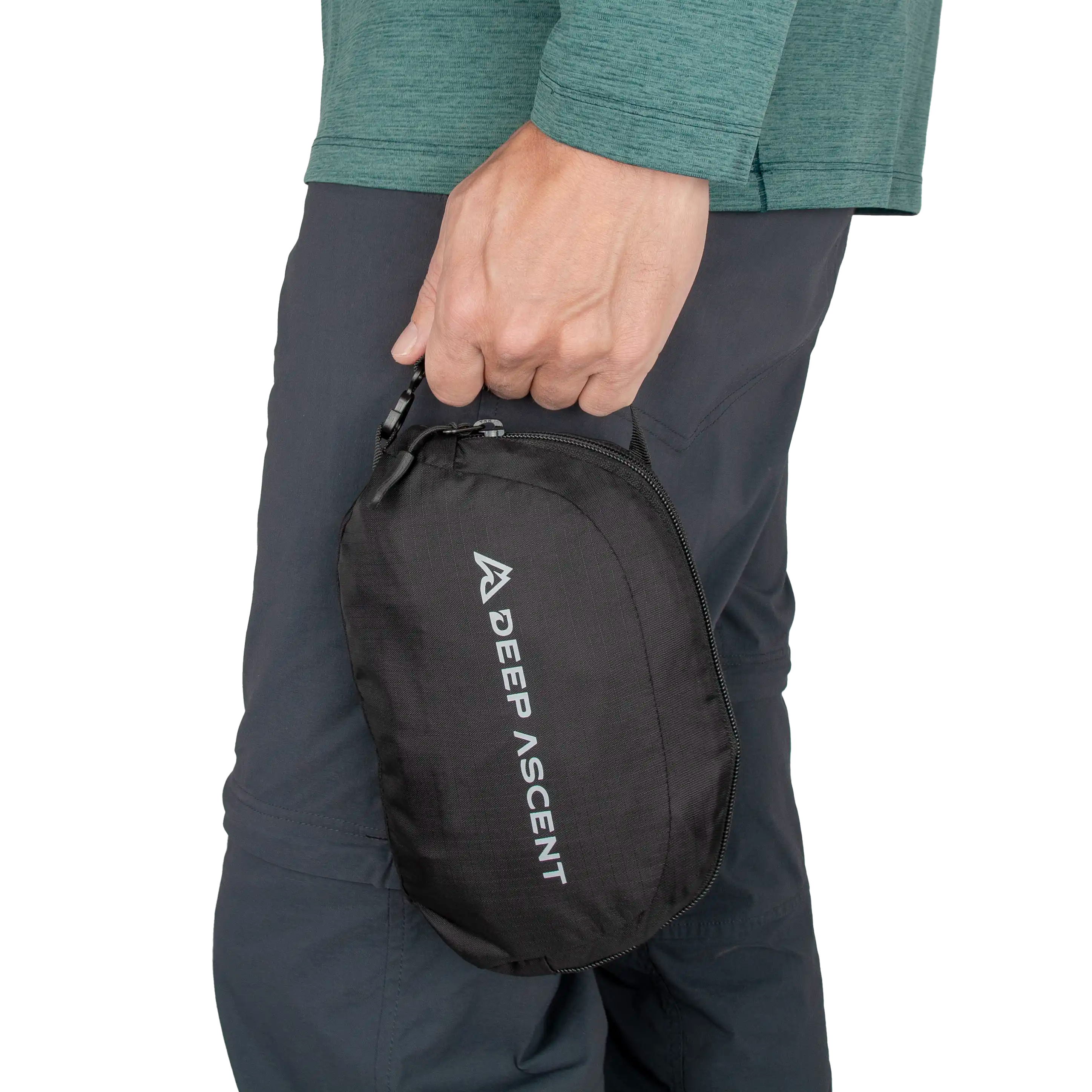Person holding a packed Ancash Packable Daypack.