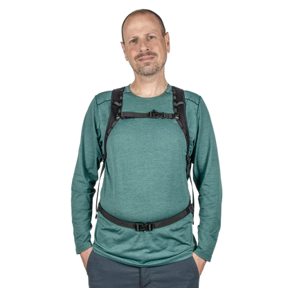 Versatile packable hiking backpack with removeable sternum strap (w/ safety whistle) and hip belt.