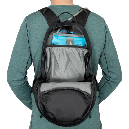 Packable hiking backpack with 100% recycled polyester inner lining and hydration compatibility.