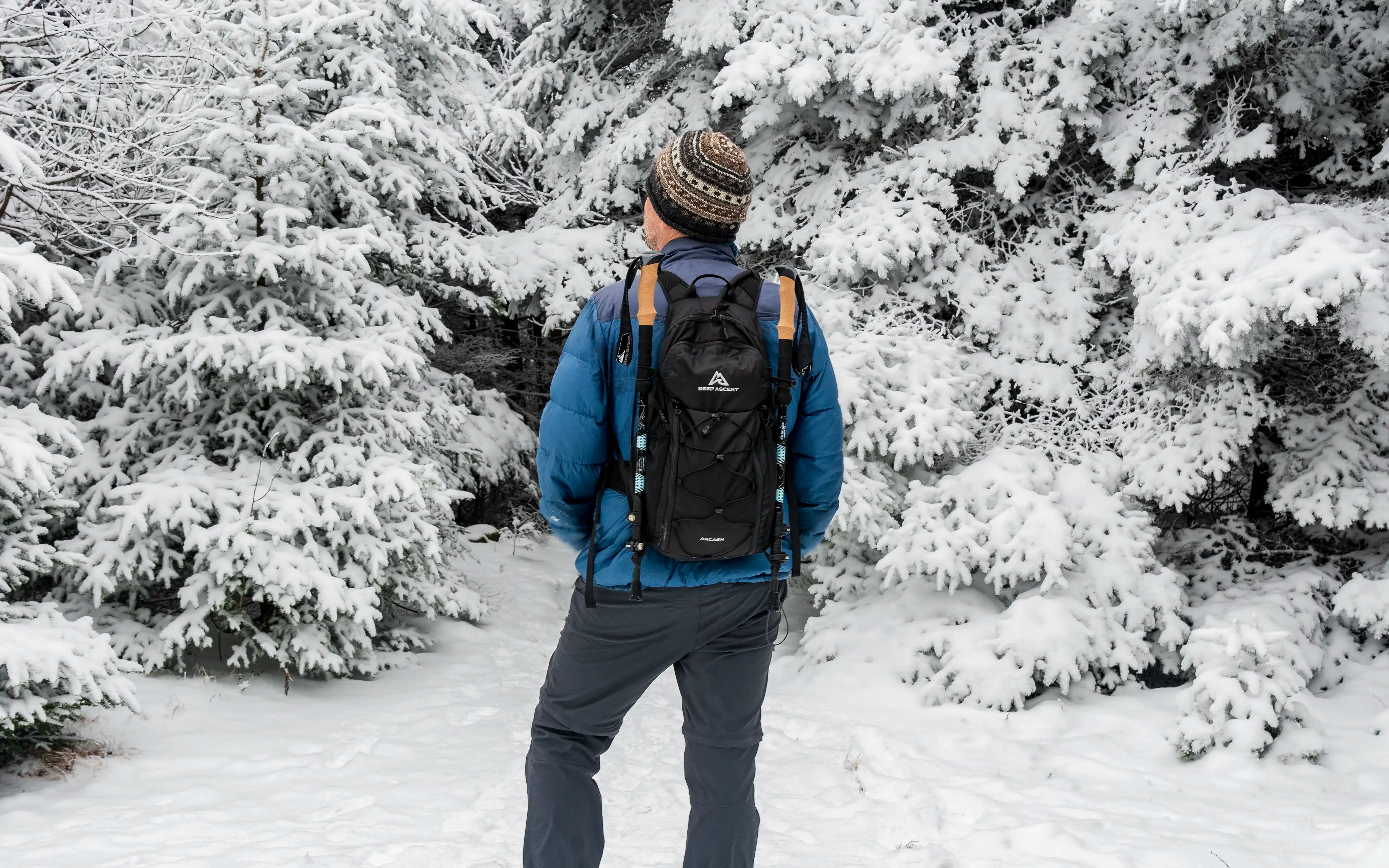 Packable hiking backpack with hiking pole attachments, eco-friendly water resistance, and hydration compatibility.