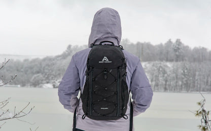 Packable hiking backpack with 26L capacity and recycled materials.