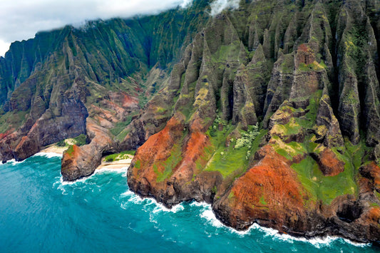 Aerial view of Honopu Beach on the Na Pali Coast in Kauai, Hawaii.